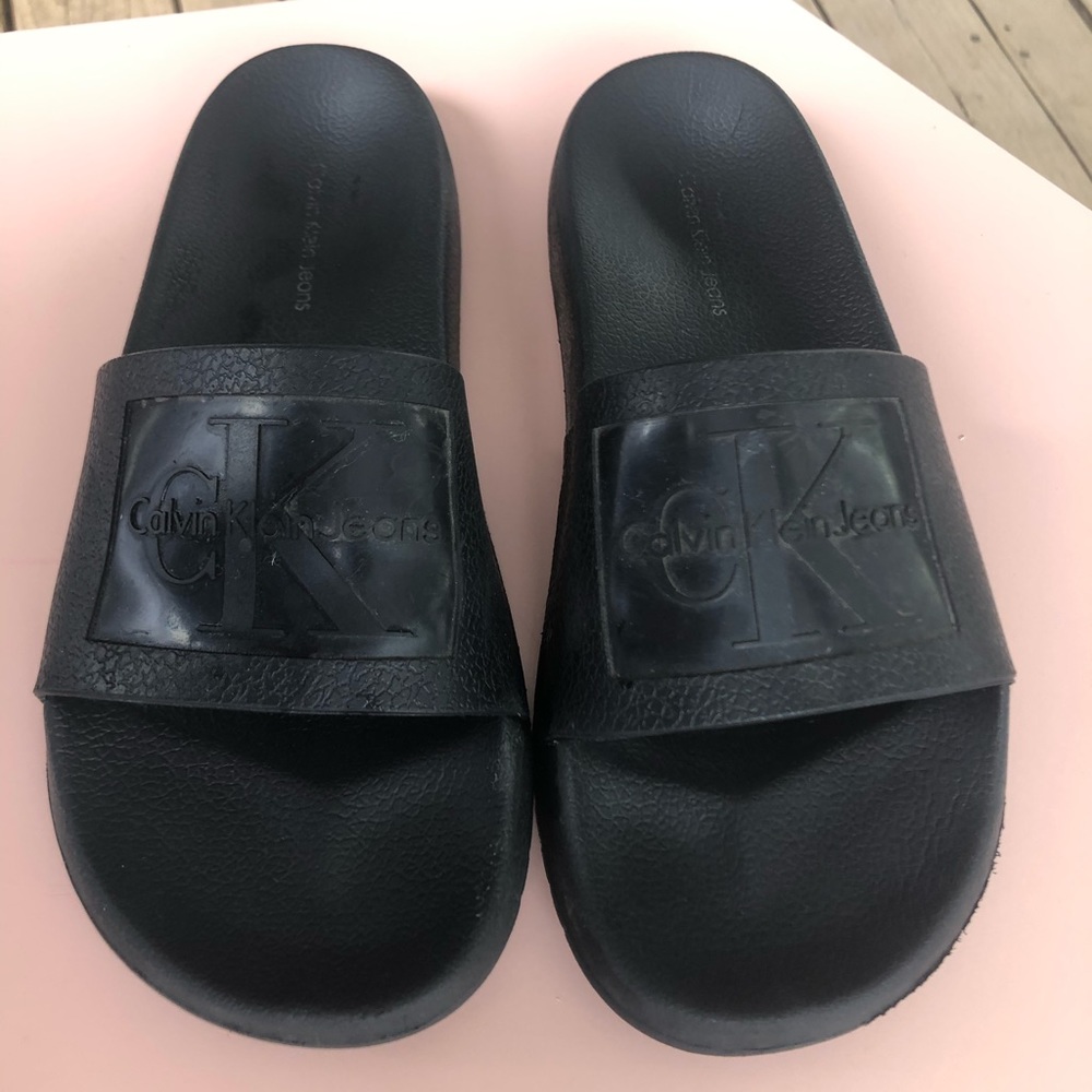 Calvin Klein “Christie” Black Slides size 7